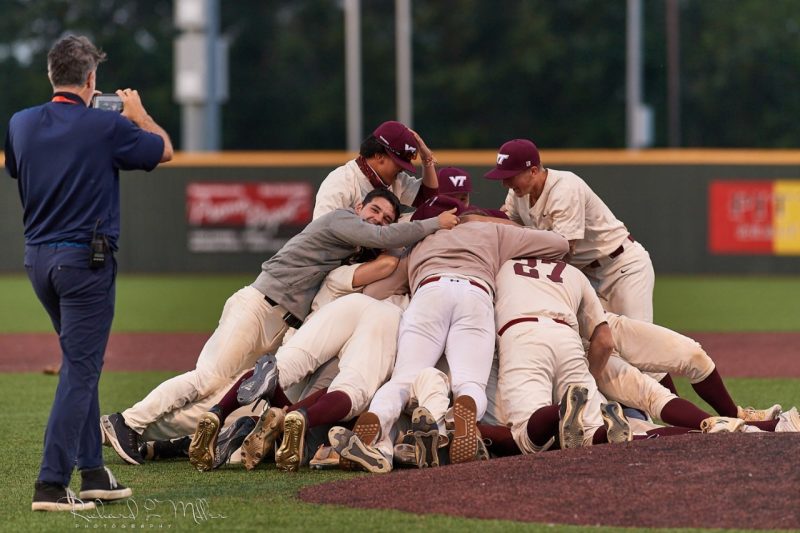The Virginia Tech baseball club team celebrates after winning the National Club Baseball Association World Series in Pittsburg, Kansas in June. Photo courtesy of Richard Miller Photography and Connor Nguyen.