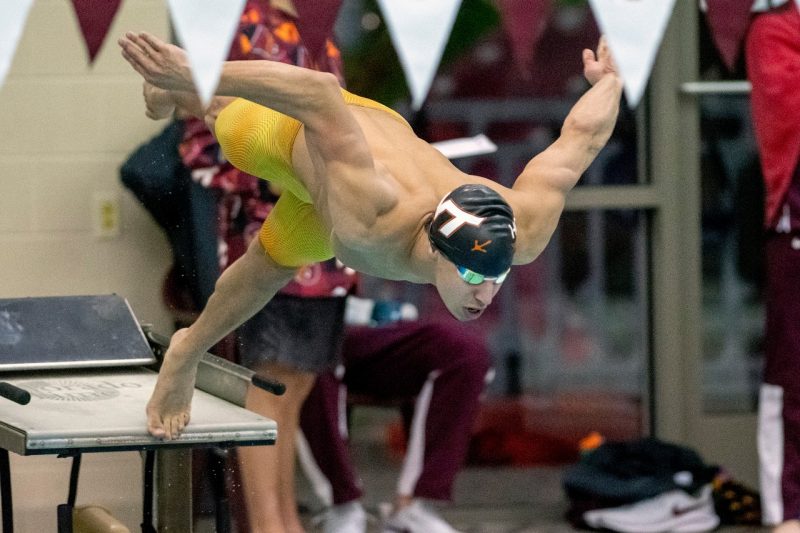 swimmer diving in