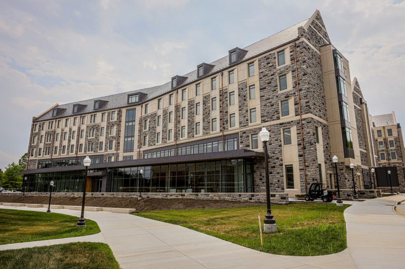 Exterior photo of the completed CID residence hall