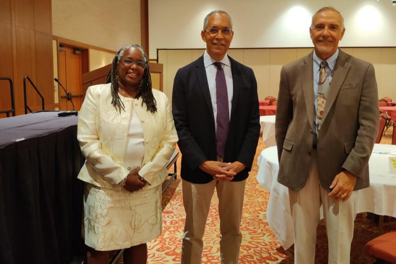 Menah Pratt-Clarke (left), Claude Steele, and Cyril Clarke at the 2021 Diversity Summit.