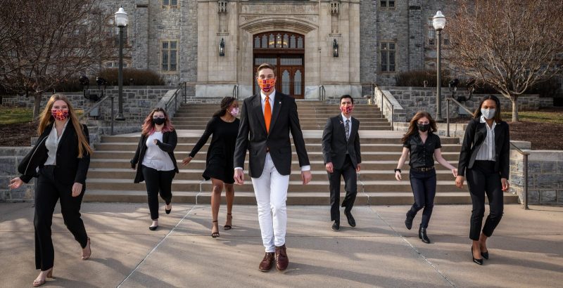 Seven of the 12 member Undergraduate Student Senate Transition Team on the steps of Burruss Hall
