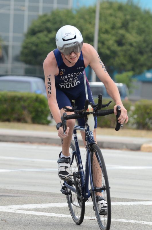 Chris Marston riding a bike at the Paratriathlon National Championships in July, 2021