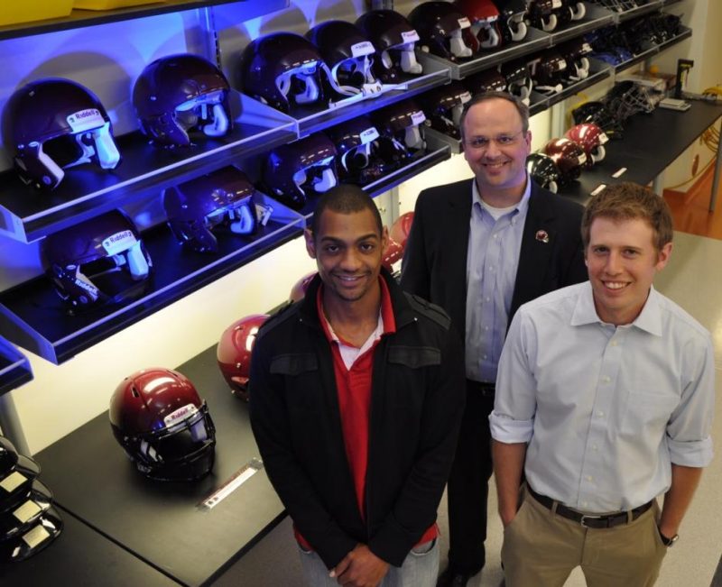Three researchers in the Virginia Tech Helmet Lab in 2013. 