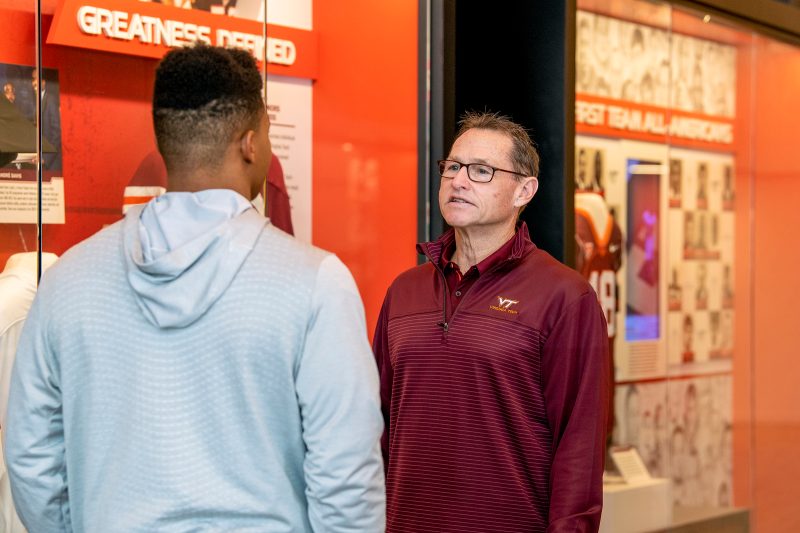Gary Bennett talking to a student-athlete