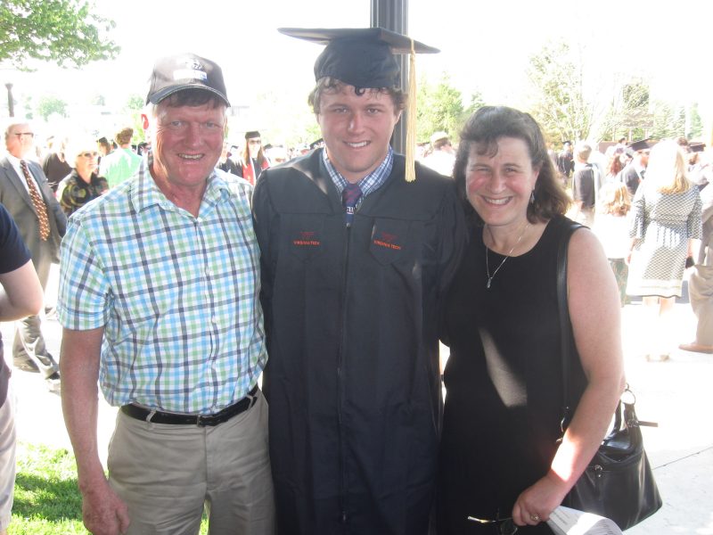 Brian McGarry with his parents at graduation