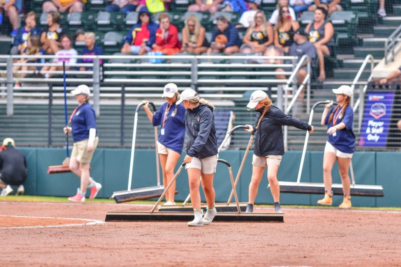 Julie Kessler helps prepare the field at the Little League World Series for Softball. Image courtesy of Little League Baseball and Softball.