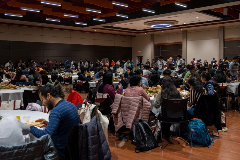 Squires Commonwealth Ballroom filled with tables of international students for the Gratitude Feast.