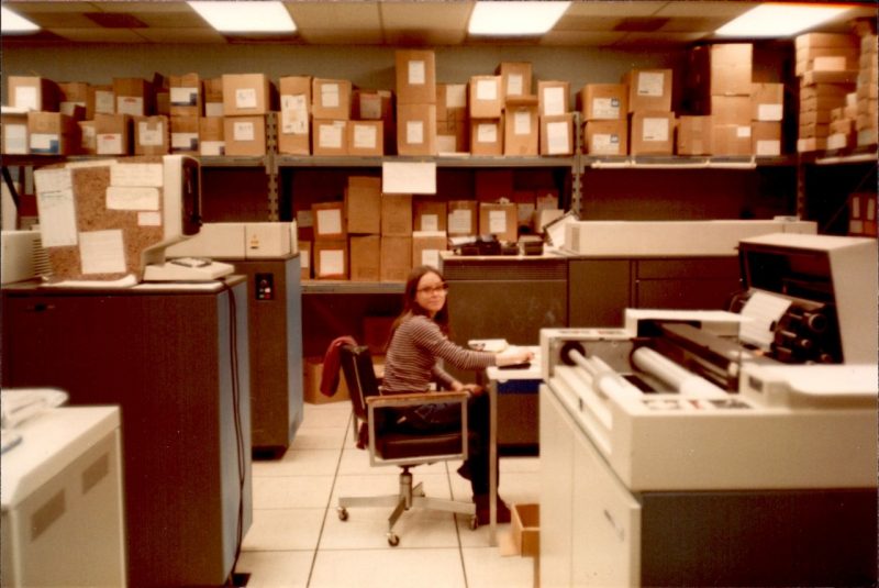 Woman (Jean Plymale) sitting in computer room in the 1980s