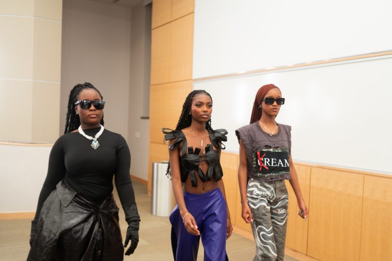 Student models for the Vetement de Rue fashion show practice for the Feb. 4 event. Photo by Brandon Kong.
